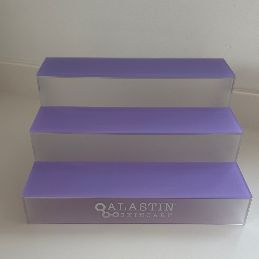 Purple Alastin Skincare Display Stand